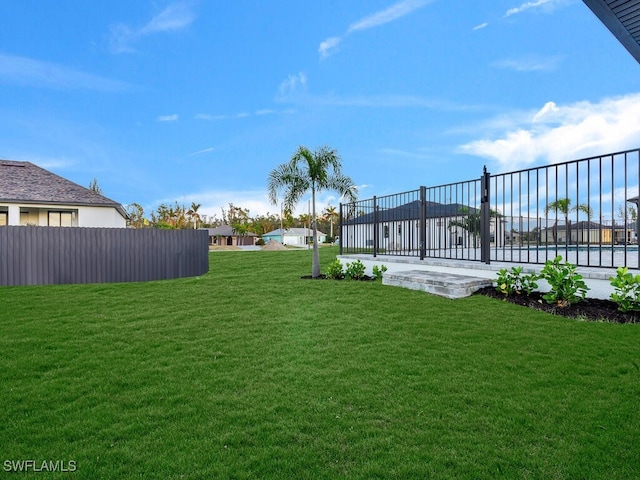 view of yard featuring fence