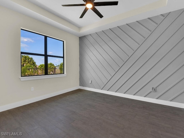 4116 NE 21st Pl, Cape Coral, FL 33909 - empty room with a ceiling fan, baseboards, and dark wood finished floors