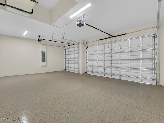 4116 NE 21st Pl, Cape Coral, FL 33909 - garage featuring a garage door opener and electric panel