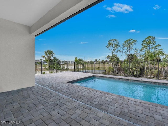4116 NE 21st Pl, Cape Coral, FL 33909 - view of pool featuring a fenced in pool, a patio area, and fence