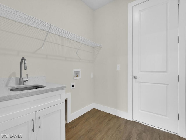 4116 NE 21st Pl, Cape Coral, FL 33909 - clothes washing area with baseboards, hookup for a washing machine, dark wood-style floors, electric dryer hookup, and a sink
