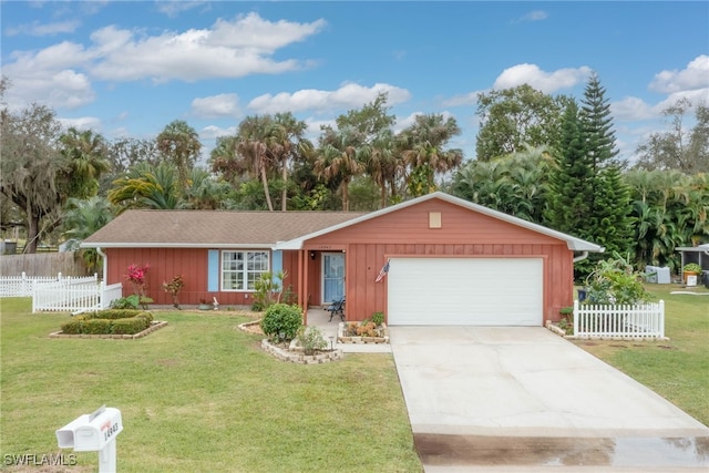 ranch-style house with a garage and a front yard