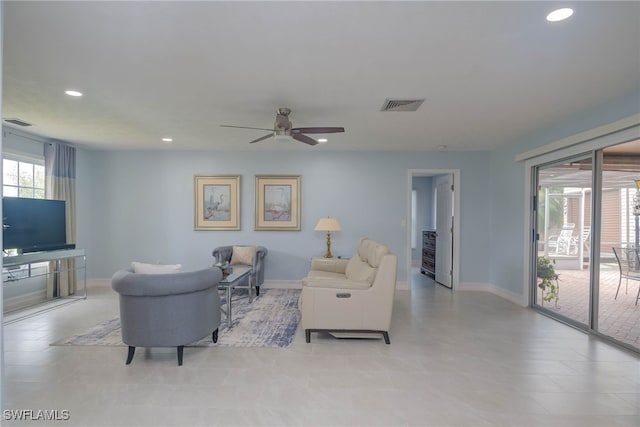 living room with ceiling fan