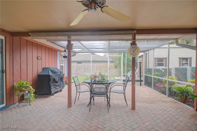 sunroom / solarium with ceiling fan