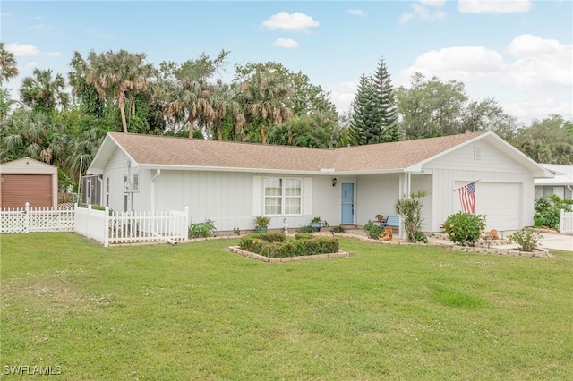 14943 Randolph Dr, Fort Myers, FL 33905 - single story home with fence, a front yard, and a garage