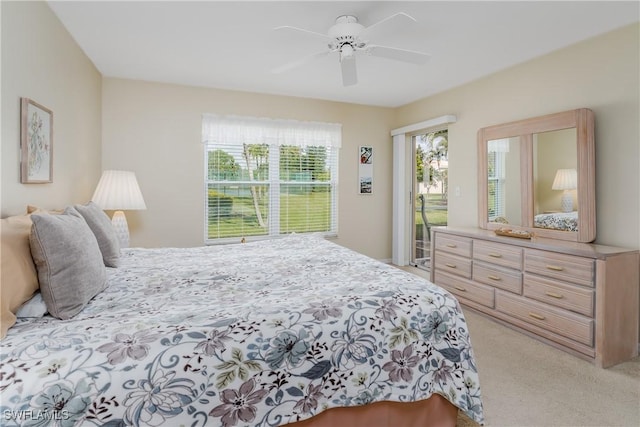 carpeted bedroom with access to exterior and ceiling fan