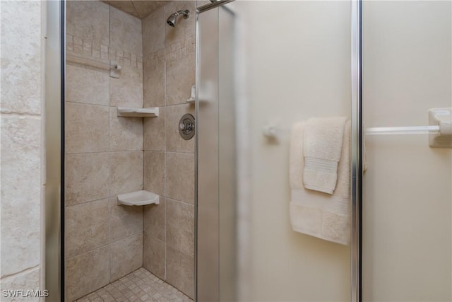 bathroom with an enclosed shower