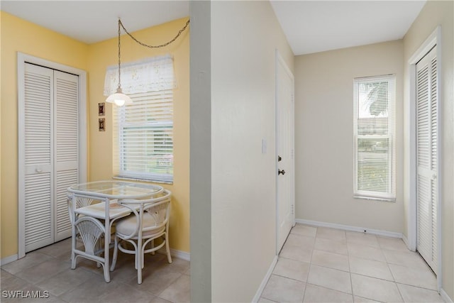 view of tiled dining space