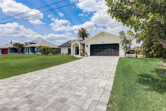 ranch-style house with a garage and a front lawn