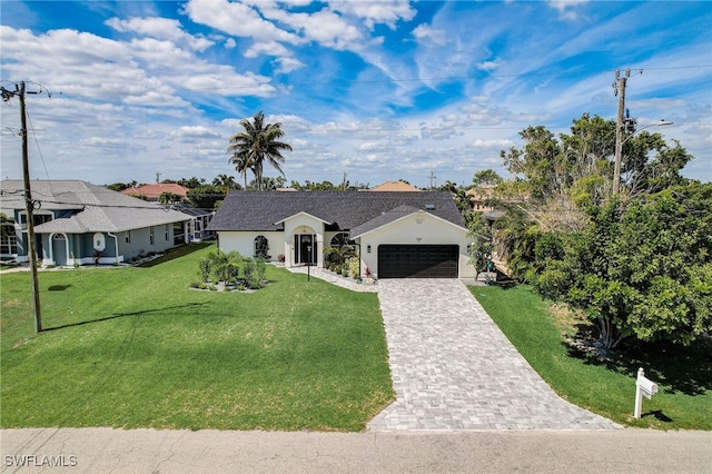 ranch-style house with a front lawn and a garage