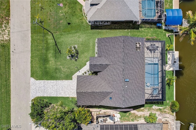 bird's eye view with a water view