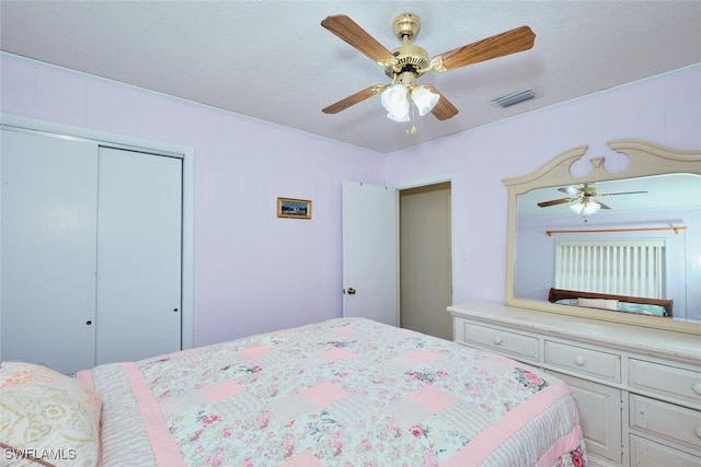 bedroom with a closet and ceiling fan