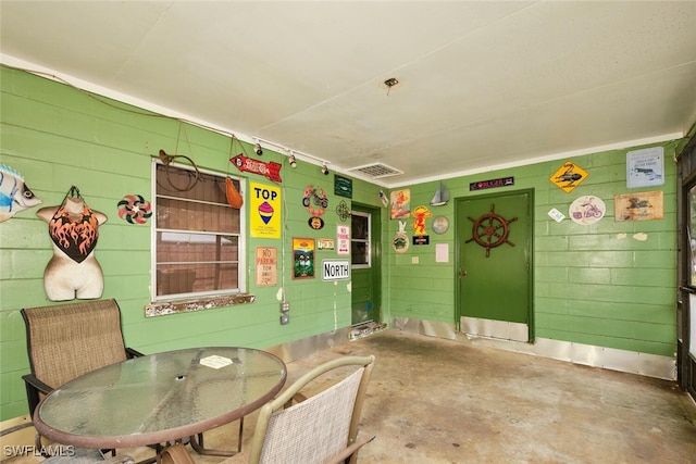 dining area with concrete floors