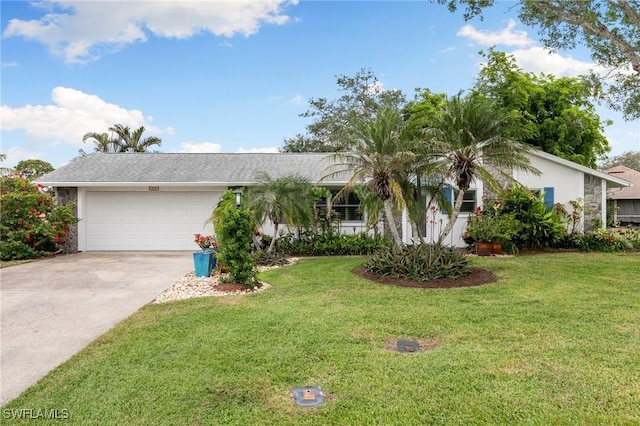 ranch-style home with a front lawn and a garage