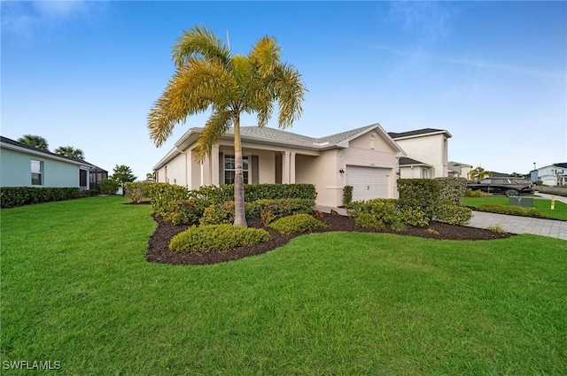 view of side of property with a lawn, an attached garage, and stucco siding