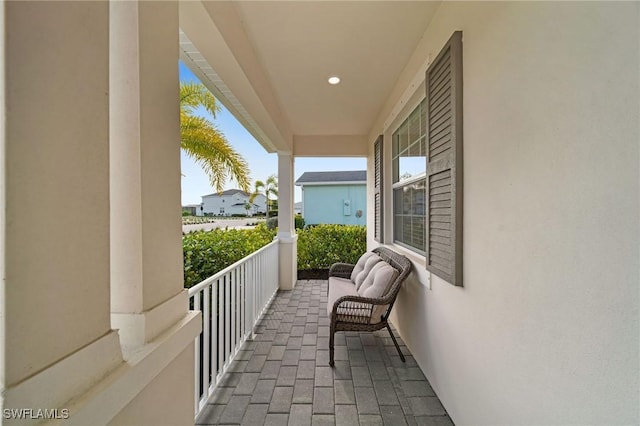 balcony featuring covered porch