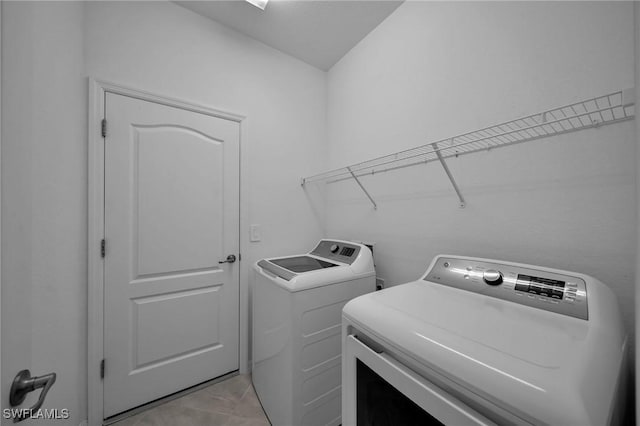 laundry room featuring laundry area and washer and clothes dryer