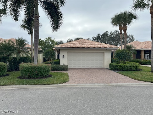 view of front of home with a garage