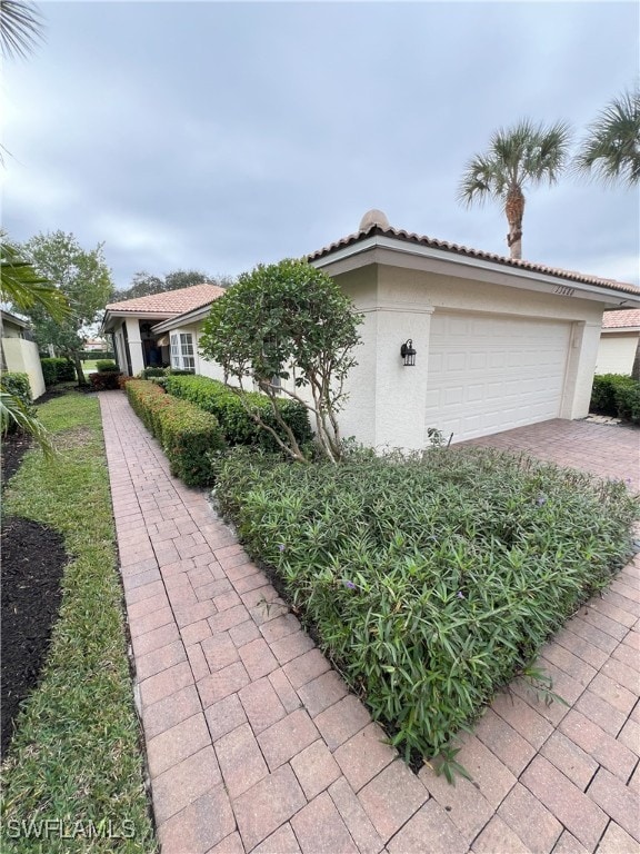 view of front of home with a garage