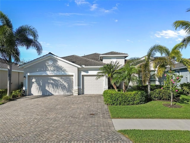 view of front of property featuring a garage