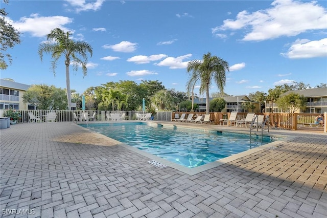 view of swimming pool featuring a patio