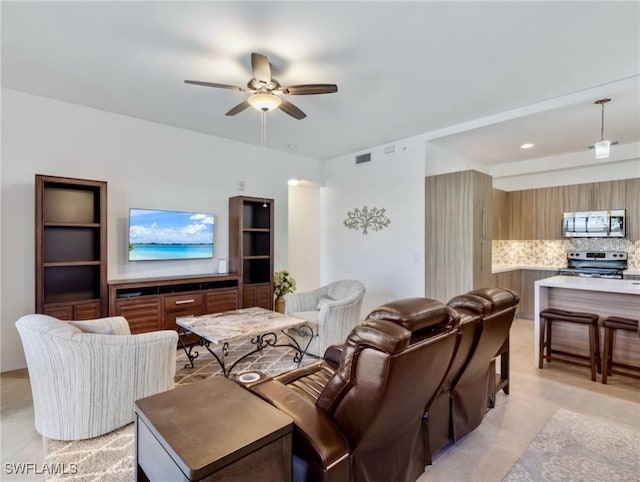 living room featuring ceiling fan