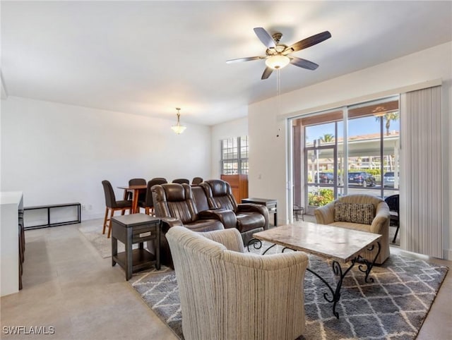 living room with ceiling fan