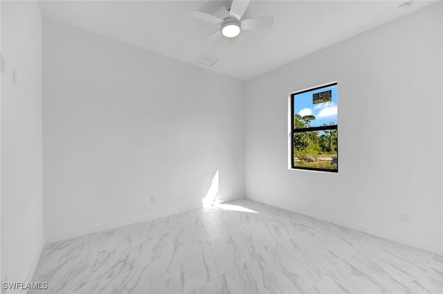 unfurnished room with ceiling fan