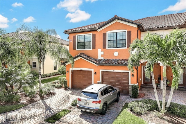 view of front of home with a garage