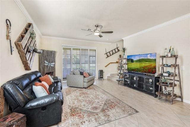 tiled living room with ceiling fan and crown molding