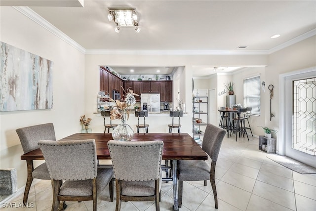 tiled dining area with ornamental molding