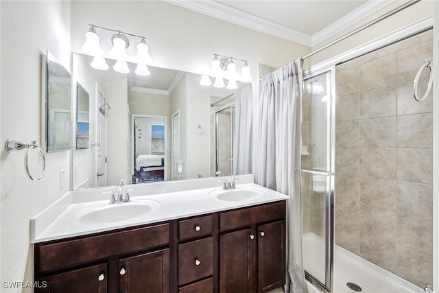 bathroom with vanity, crown molding, and an enclosed shower