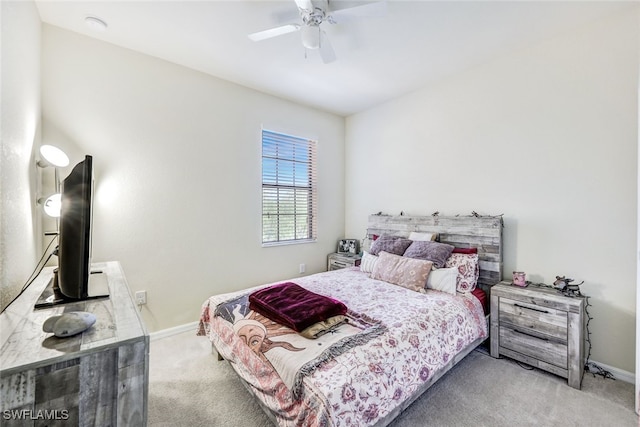 bedroom with ceiling fan and carpet floors