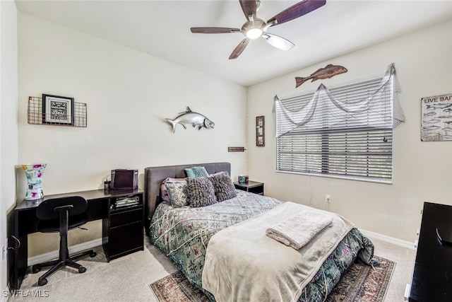 bedroom featuring ceiling fan and light colored carpet