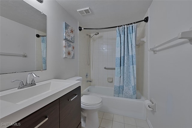 full bathroom with toilet, tile patterned flooring, shower / bathtub combination with curtain, a textured ceiling, and vanity