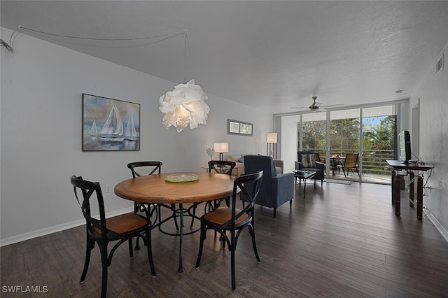 dining room featuring floor to ceiling windows, dark wood-type flooring, a textured ceiling, and ceiling fan