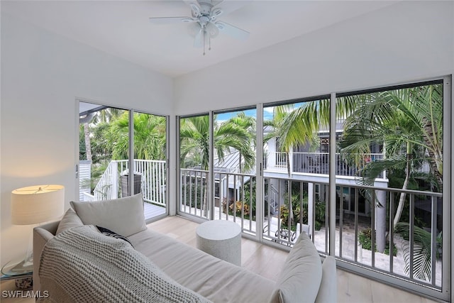 sunroom / solarium with ceiling fan