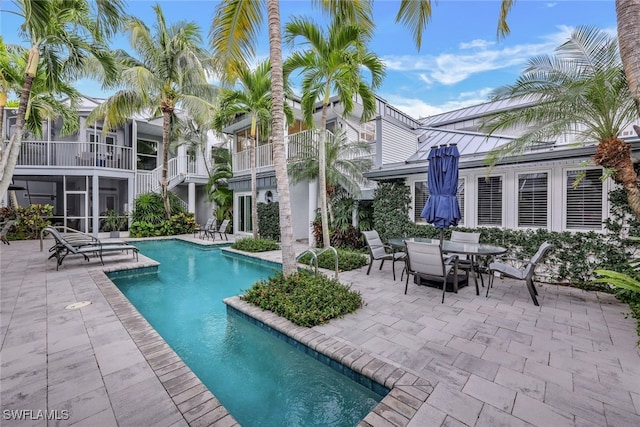 view of pool featuring a patio area