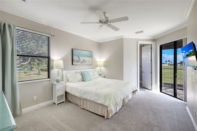 carpeted bedroom with ceiling fan, access to exterior, ornamental molding, and multiple windows