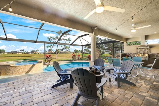 view of patio / terrace with ceiling fan, a grill, area for grilling, a lanai, and a swimming pool with hot tub