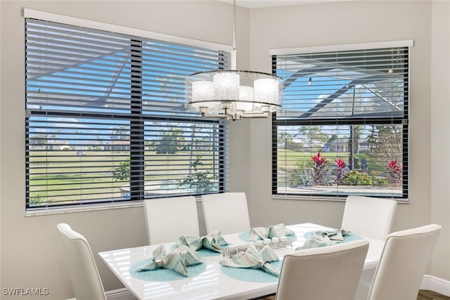 dining area with a chandelier