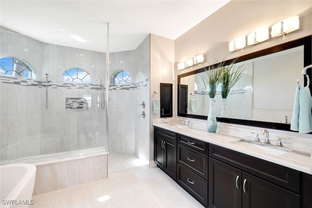 bathroom with independent shower and bath, tile patterned flooring, and vanity