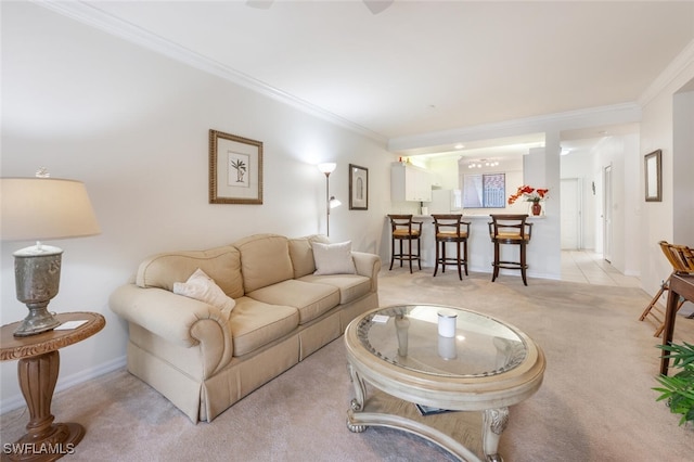 carpeted living room with ornamental molding