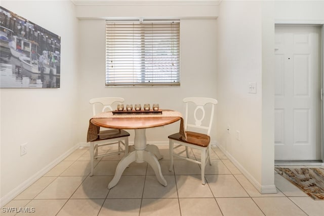 dining room featuring light tile patterned flooring