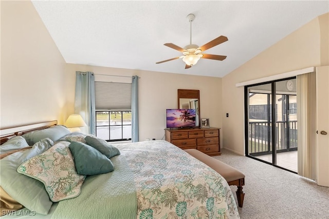 bedroom featuring ceiling fan, access to exterior, carpet, and vaulted ceiling