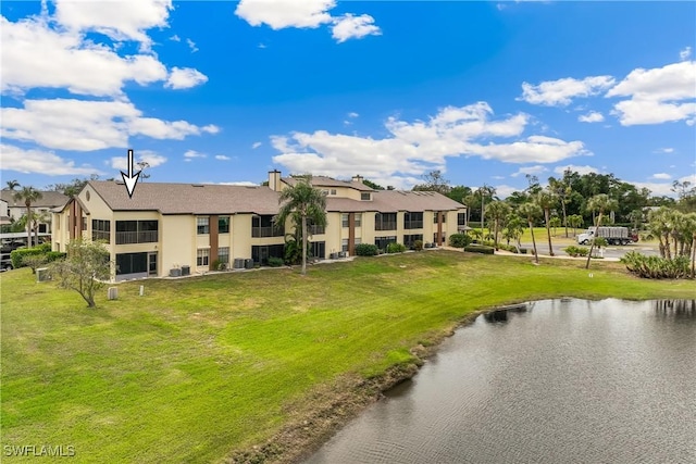 exterior space with a water view