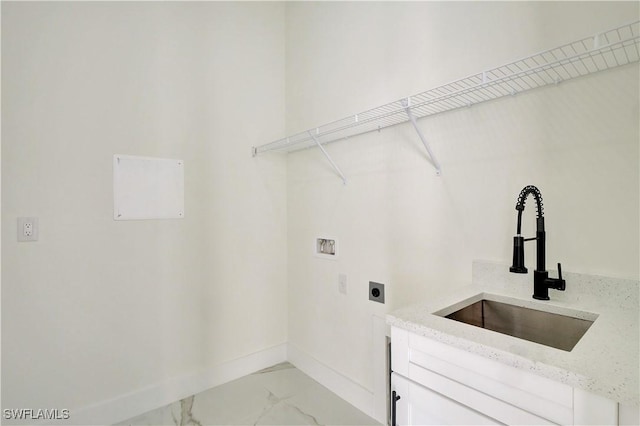 washroom with washer hookup, marble finish floor, cabinet space, a sink, and electric dryer hookup