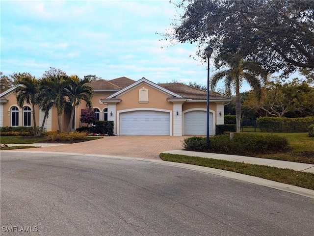 ranch-style house with a garage