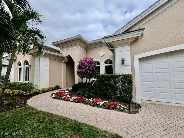 entrance to property featuring a garage