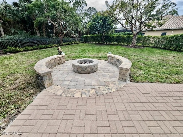 view of patio featuring an outdoor fire pit